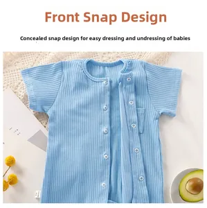 Detail of light blue ribbed cotton baby romper with front buttons and small pocket
