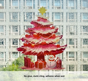 Detail of pink Christmas tree static window sticker showing water-activated glue-free design