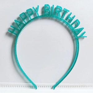 Detail of cyan glitter plastic headband featuring Happy Birthday lettering decoration