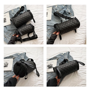 Multi-angle view of a black quilted cylinder bag with an adjustable nylon shoulder strap
