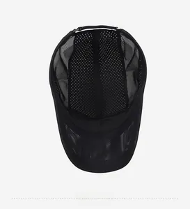 Detailed view of the breathable mesh lining and inner structure of the black quick-dry cap