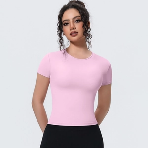 Detail of pink slim-fit yoga t-shirt featuring breathable fabric and basic round neck