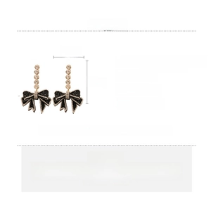 Detailed size and material specifications for dark crystal bow earrings with dimensions
