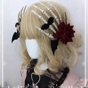 Gothic Halloween hair clips set with white skeleton hands, red rose and bat wings