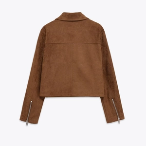 Back view of a cropped brown faux suede jacket with metallic zipper details and stitching