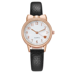 Detail of quartz watch featuring cute cat-ear rose gold case and black leather strap