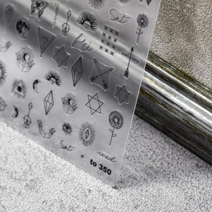 Japanese style black star and moon nail art stickers with celestial patterns on thin film