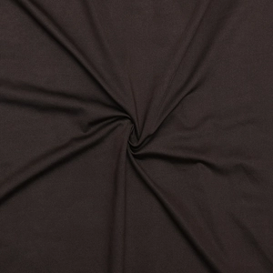 Close-up of deep brown knit fabric texture with soft draping and detailed weave pattern