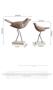 Detailed dimensions of Nordic wooden bird figurines set on rectangular black metal stands