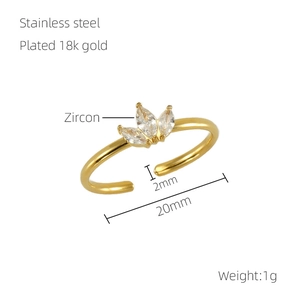 Detail view of 18k gold plated maple leaf ring with three teardrop zircon stones