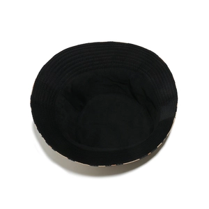 Detailed top view of a leopard print bucket hat showing the black inner lining and wide brim