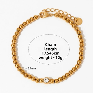 Detail of gold beaded bracelet with zircon inlay, 17.5+5cm length and 12g weight