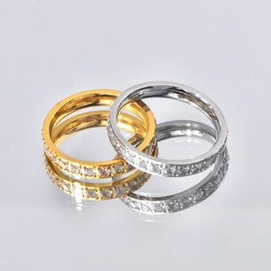Stackable titanium steel band rings in gold and silver with full pave cubic zirconia