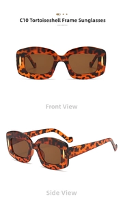 Close-up of tortoise shell frame sunglasses with tea lenses and golden metal accents