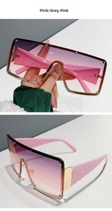 Macro detail of pink frame sunglasses with studded lenses and quilted pattern temples