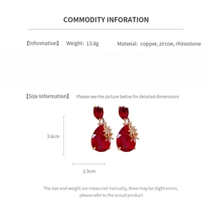 Detail view of red waterdrop earrings with zircon and rhinestone weight and size specs