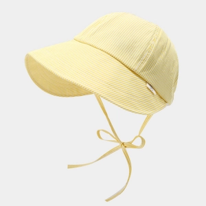 Detail of yellow and white striped baby sun hat with wide brim and chin strap bow