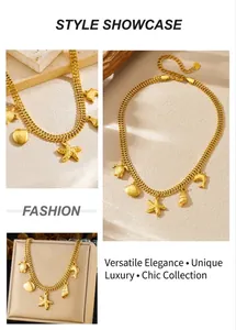 Detail of gold-plated woven chain necklace with starfish and sea turtle charms