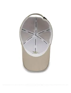 Detailed view of the khaki baseball cap interior showing the sweatband and stitching