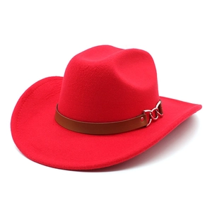 Detail of red wool felt cowboy hat with brown leather band and silver metal chain link