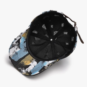 Breathable cotton baseball cap with abstract graffiti print and distressed frayed brim