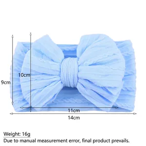 Light blue baby nylon headband with oversized cable knit bow and stretch texture