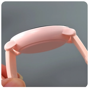 Close-up side view of a pink minimalist waterproof digital watch with soft silicone strap