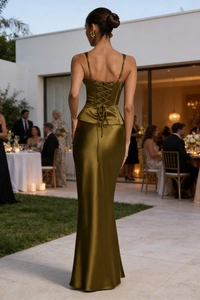 Detailed back view of olive green satin evening dress featuring an elegant corset tie closure