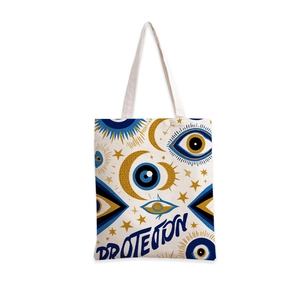 Détail du cabas en toile blanche avec imprimé œil protecteur bleu et texte PROTECTION