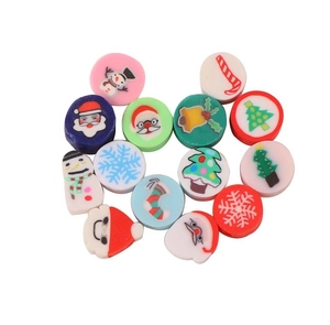 Detailed macro shot of festive Christmas polymer clay beads for DIY jewelry making
