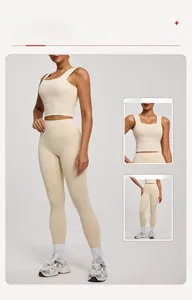 Detail of beige wide-strap sports bra and high-waist seamless leggings yoga set