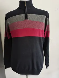 Detail of slim-fit men's sweater with half-zip stand collar and color-block stripes