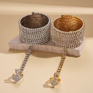 Sparkling multi-layer geometric ring bracelet with rhinestones in gold and silver finish