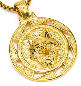 Macro shot of gold wolf head relief pendant with textured details and square pearl chain