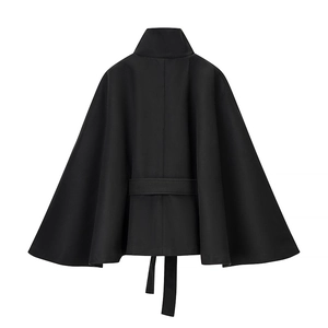Rear view of black wool-blend poncho jacket showing waist tie and fabric texture