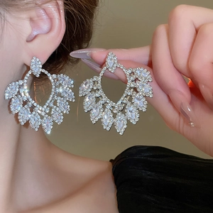 Elegant silver-tone water drop zircon chandelier earrings shown on model for party