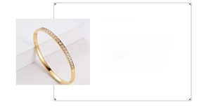 Detail showing 316L stainless steel gold bangle with inlaid sparkling rhinestones