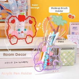 Macro detail of cartoon acrylic stationery holder for 25 pens and makeup brushes