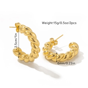 Detailed size view of C-shaped twisted gold hoop earrings showing 2.5cm diameter