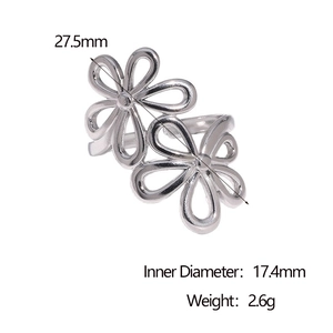 Detailed view of silver hollow double flower ring with size measurements and weight data