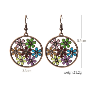 Detailed view of bohemian floral drop earrings with dimensions 3.3cm by 5.5cm