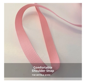 Close-up of durable pink woven shoulder strap with clean texture for children's crossbody bag