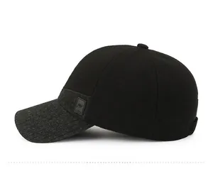 Detail view of winter baseball cap showing side profile with stitched logo patch