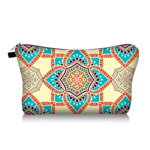 Detail of colorful mandala print travel cosmetic bag with secure black zipper closure