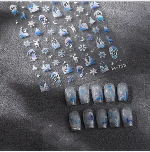 Detail of M-753 nail stickers with laser deer and snowflake patterns on gray matte nails