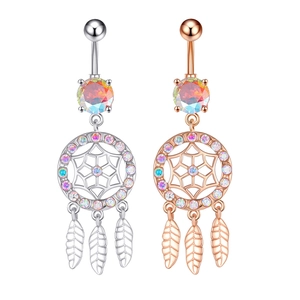 Detail of dreamcatcher belly rings in silver and rose gold with dangling feathers