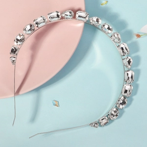 Detail of elegant wheat ear headband with sparkling rhinestones on a metal frame