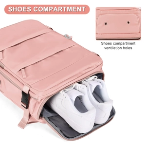 Pink travel backpack with a separate shoe compartment and ventilation hole detail