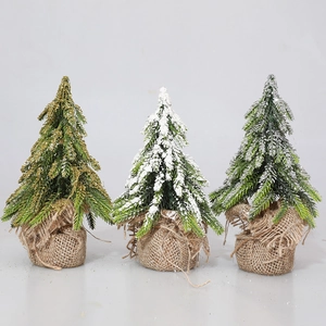 Set of three mini burlap base Christmas trees with frosted snow for table decoration