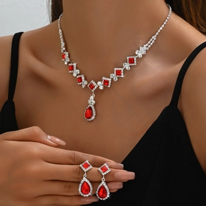 Elegant silver necklace and red teardrop earrings set for bridal wedding jewelry